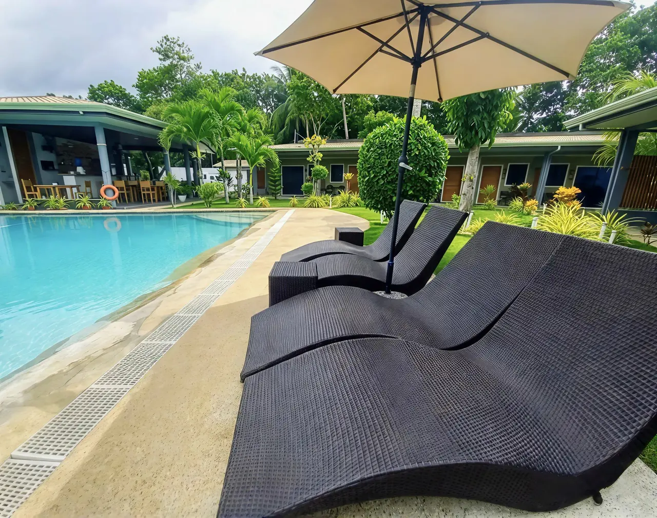 Hidden Lagoon Resort — pool loungers